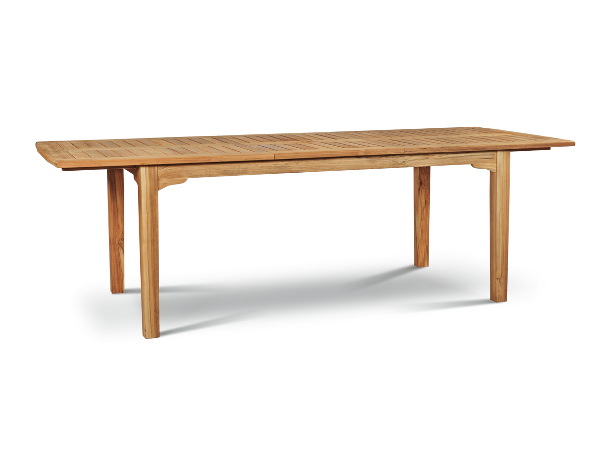 Clarisse teak dining table with self-storing extension leaves, by Curated Maison