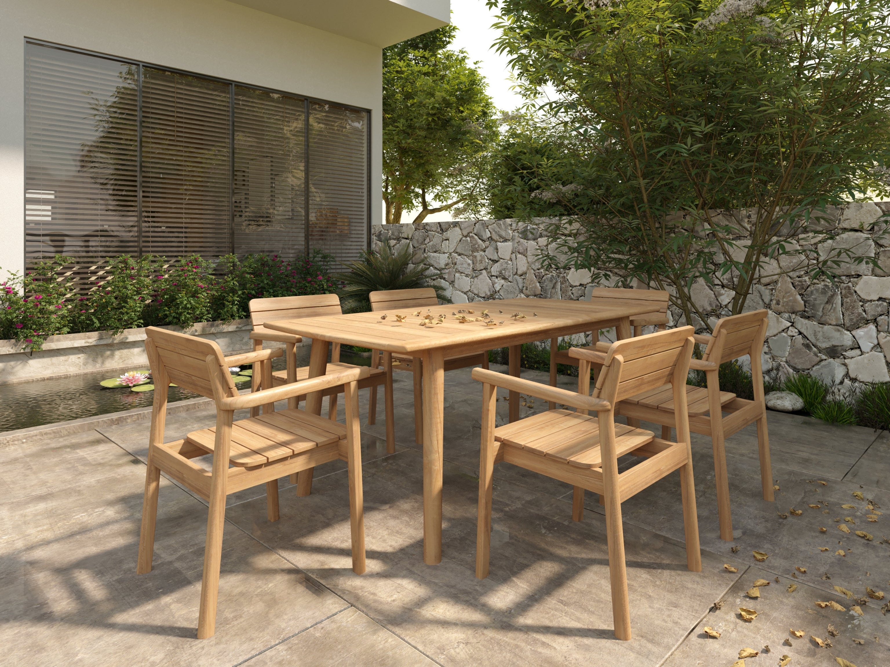 Riva teak dining armchair — lifestyle view