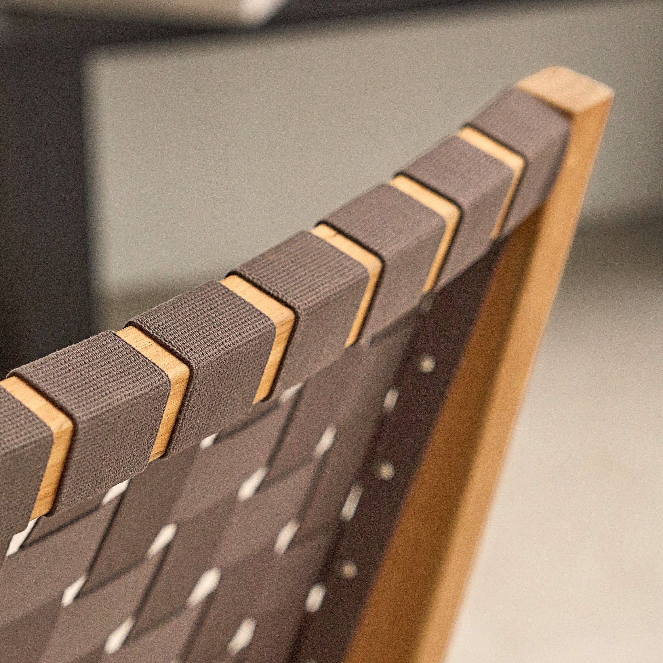 Laurent lounge chair hand-woven strap grid detail