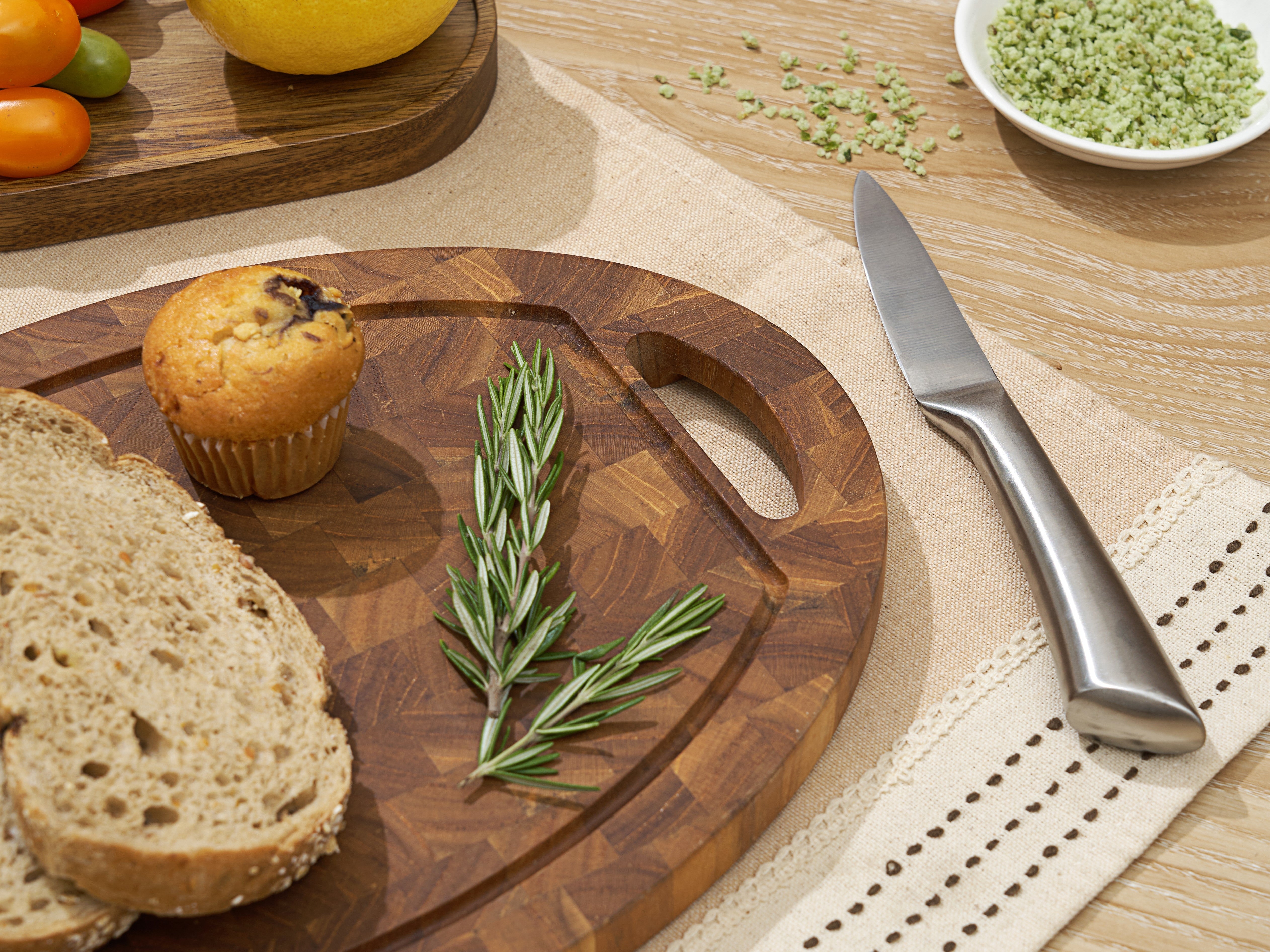 Coupe teak cutting board juice groove detail