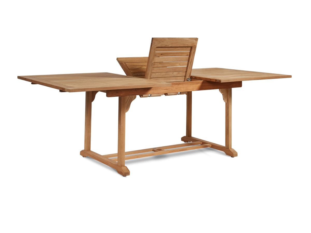 Belmont teak dining table with self-storing extension leaves, by Curated Maison